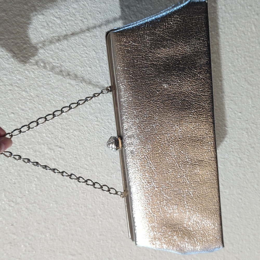 Vintage metallic clutch